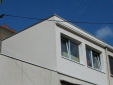 Extension sur une terrasse d'immeuble au centre de la ville (vignette 1)