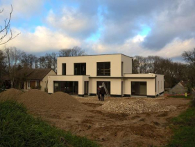 Maison ossature bois/parement enduit dans l'Yonne en cours de travaux